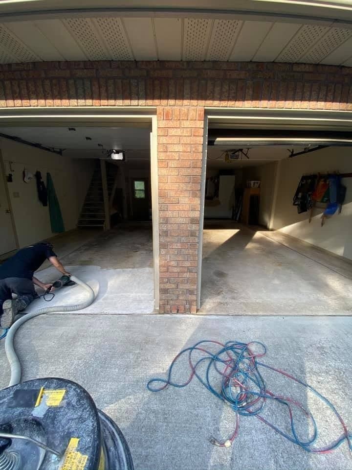 Diamond grinding a garage slab before coating