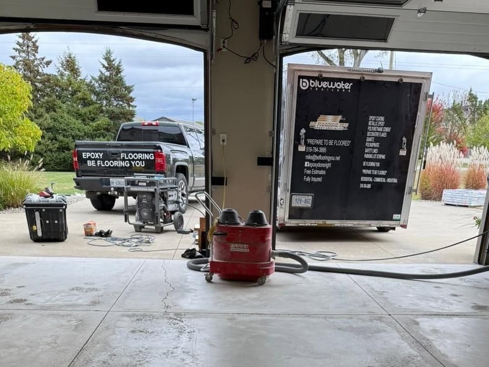 Be Flooring You equipment trailer set up at a customer's garage